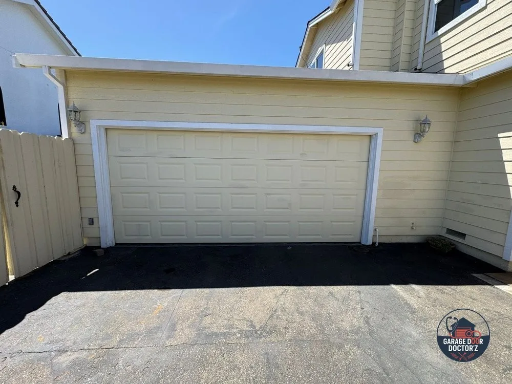 Before: Damaged, Worn-Out Garage Door System