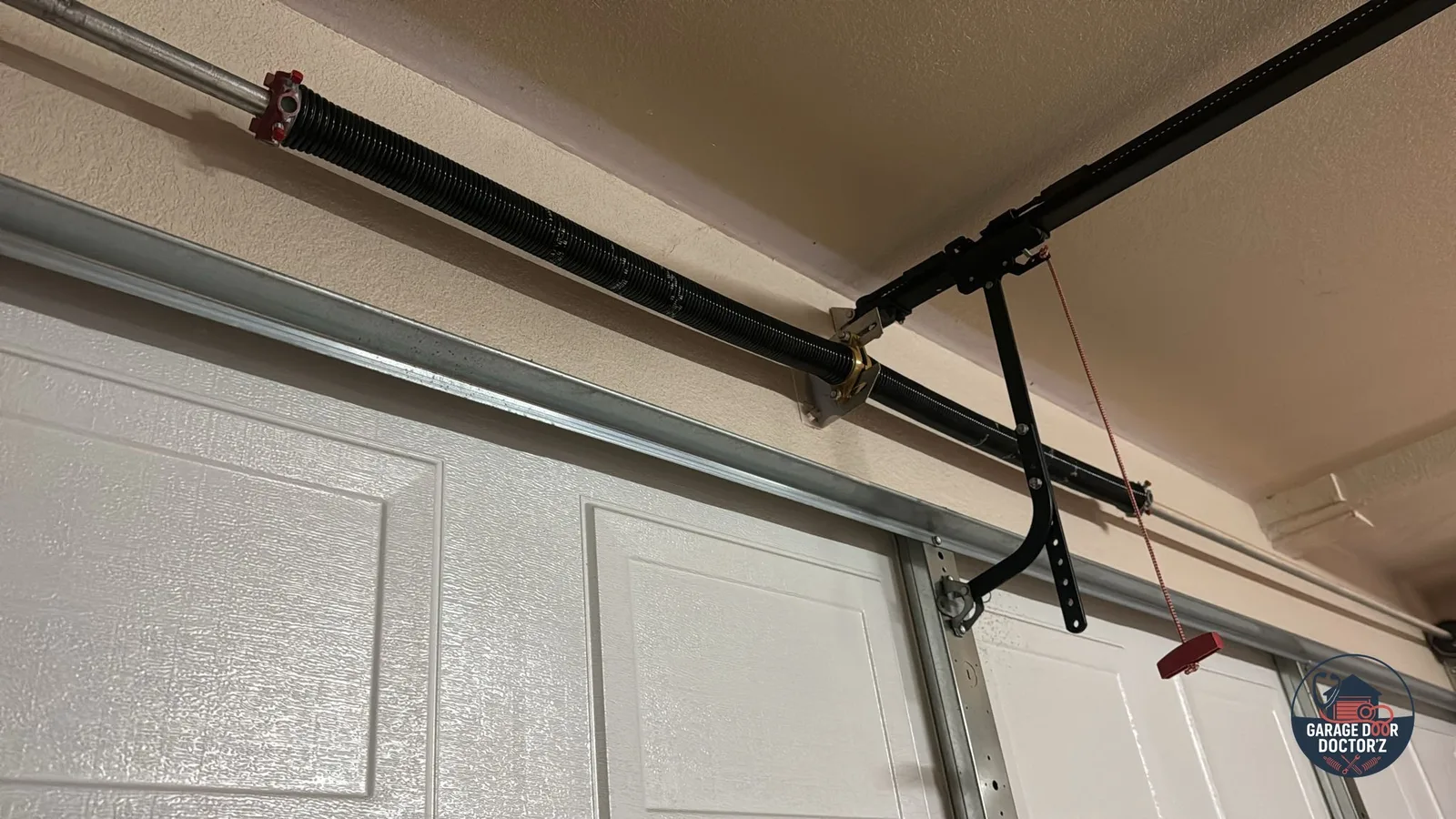 The Snapped Spring Danger: Why DIY Replacement Can Be Fatal