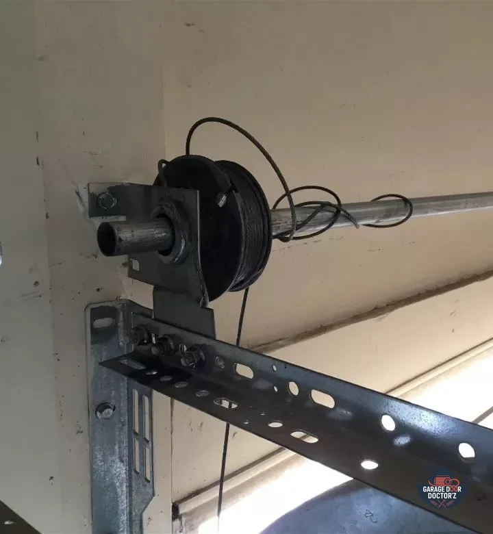 Crooked Garage Doors: Why Snapped Lift Cables Are an Emergency